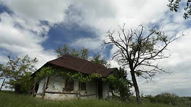 Abandoned house. Timelapse clouds and wind