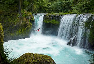 A bold Kayaker goes over the gushing Spirit Falls