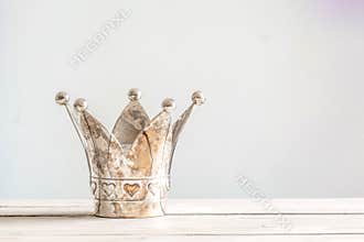 Princess crown on a wooden table