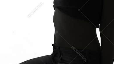 Woman shows fat on her stomach