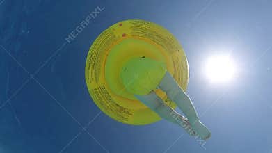 Baby float in summer swimming pool