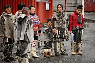 Inuit eskimo people welcoming foreigners