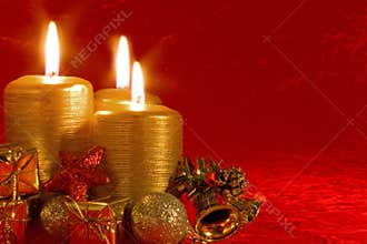 Three burning Christmas candles