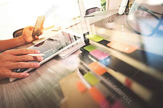 Website designer working digital tablet and computer laptop with