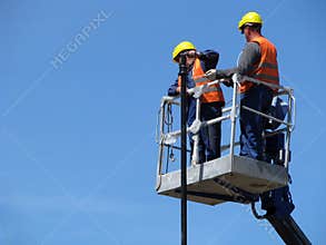 Men at work on the lifter