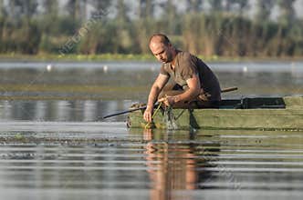 Fisherman pulls net