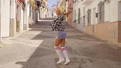 Model Walks The Mediterranean Street Along