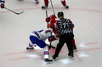 R. Horak (15) and P. Datsyuk (13) on faceoff