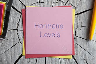Hormone Levels written on a note