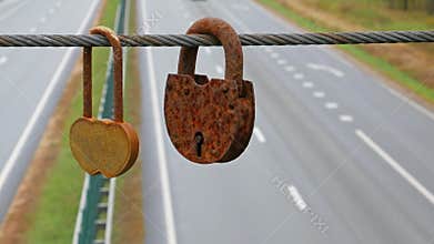 Lovers bridge with numerous love locks