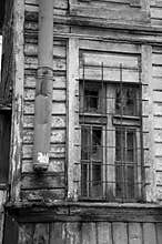 Broken window in old wooden house black and white, very sharp