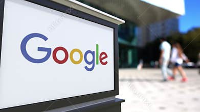 Street signage board with Google logo. Blurred office center and walking people background. Editorial 4K 3D rendering
