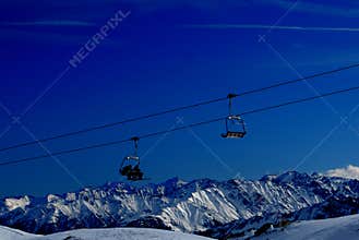 Ski lifts in alps mountains