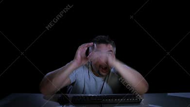 Man afraid of watching online movie. Emotions of fear. Studio