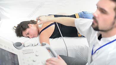 Woman Being Checked at Ultrasound Device