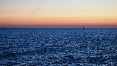 Silhouette vessel navigating sunrise sunset