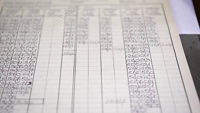 A number chart with different values used in manufacturing, selective focus