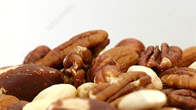 Close up of nuts rotating by