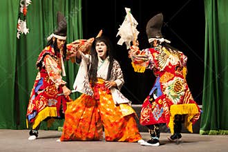 Japanese actors performing samurai play