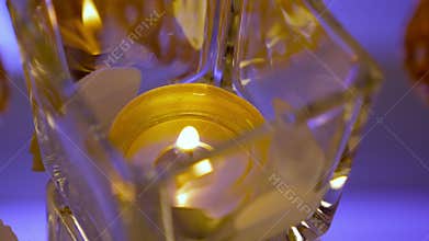 Candle in a glass vase