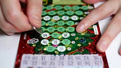 Scratching lottery ticket