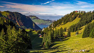 Swiss Alps valley with lake Lucerne in the background from Klewenalp , Central Switzerland