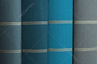 Stack of books, book spines in row