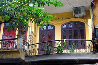 Front French colonial house doors windows, Hanoi, Vietnam
