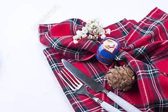 Cutlery, tablecloths and napkins for celebrating Christmas. Free space for text