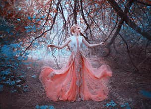 Delightful queen blond elf standing in the forest near the branches of trees that touch the ground, wearing a light