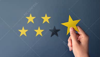 Customer Experience Concept, Best Excellent Services for Satisfaction present by Hand of Client giving a Five Star Rating