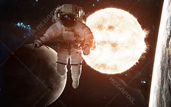 Astronaut on background of the Sun. Solar system. Earth and moon. Elements of the image were furnished by NASA