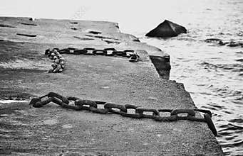 Close-up image of an old rusted chains