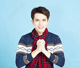 Asian man with gesture of congratulation