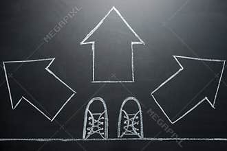 Taking decisions for the future man standing with three direction arrow choices, left, right or move forward