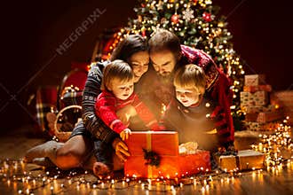 Christmas Family open Lighting Present Gift Box under Xmas Tree, Happy Mother Father Children