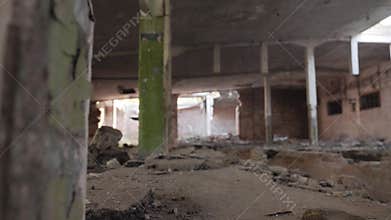 Cinematic plan of an old abandoned factory. Broken building.