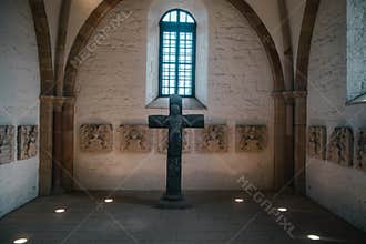 Catholic church interior with medieval walls and arch designed construction