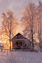 Small, Wooden, beautiful, wooden house at sunset.