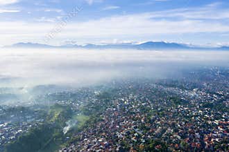 Beautiful countryside at misty morning in Bandung
