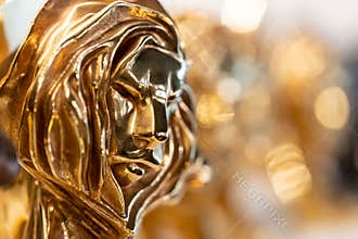 Closed up of gold Cannes lion award, trophy for winner of advertising agency in yearly festival in Cannes, France