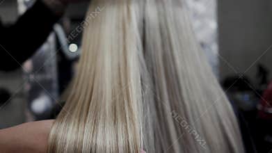 Hair for hair extension. Hair for hair extension is applied to the head. 4K