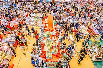Top view a lot of people walking on the ground floor shopping in department store area at Singapore