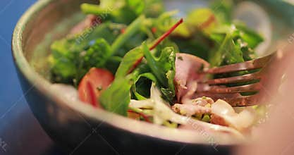 POV, eating fresh salad, smoked duck meat on a fork, food video