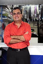 Happy owner of a dry cleaning business