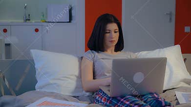 Businesswoman works at home.