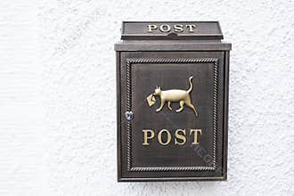 Decorative mail post box with dog icon