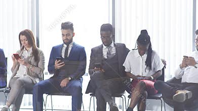 Mixed race people preparing for job interview