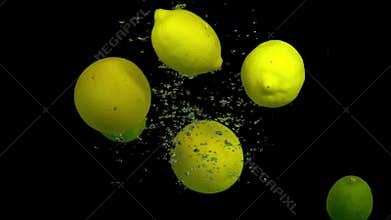 Citrus fruit in splash water on a black background