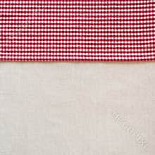 Country Style Red and White Checked Cloth Napkin along side of Off White Linen Tablecloth as blank Background with room or space f